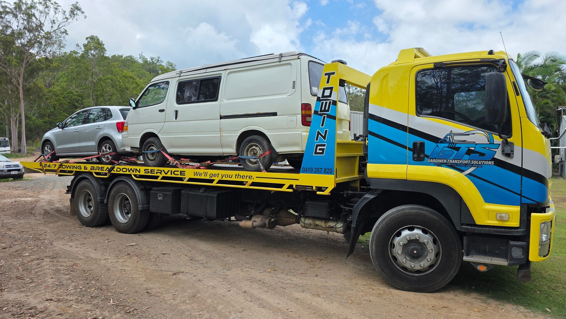 Tow Truck With a White Van and a Silver Car on Its Flatbed — GTS - Gardiner Transport Solutions in Berserker, QLD