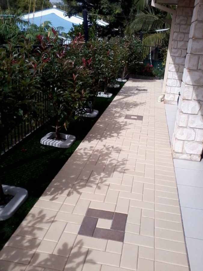 artificial grass walkway with feature