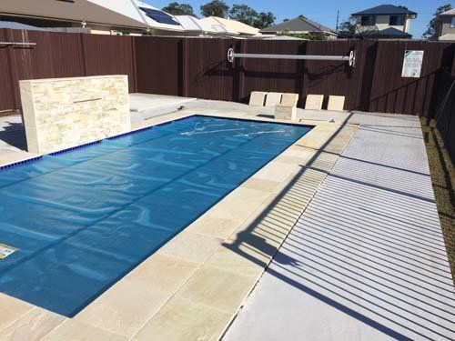 tile walkway around pool