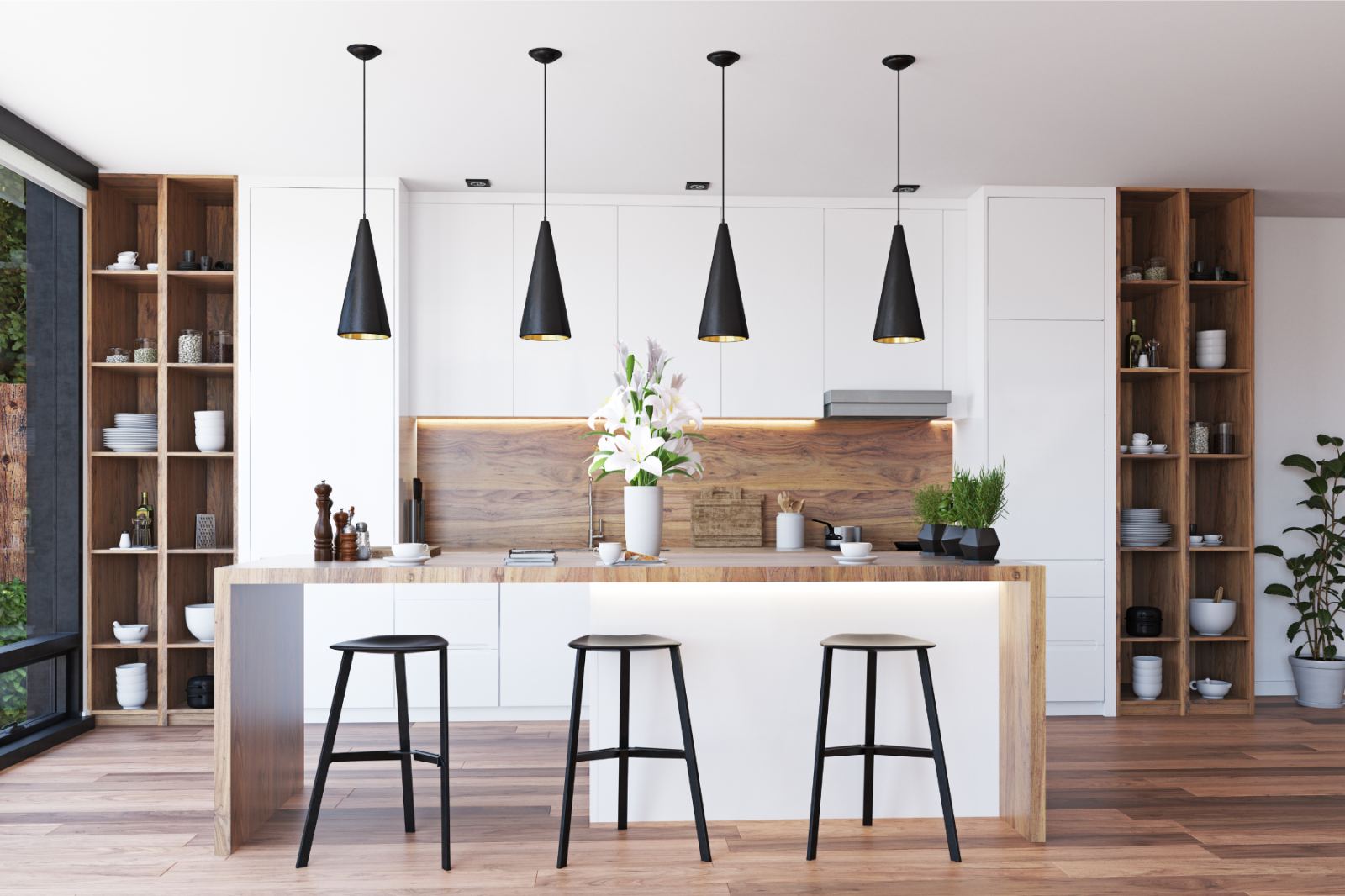 A kitchen with white cabinets , wooden counter tops , and stools.