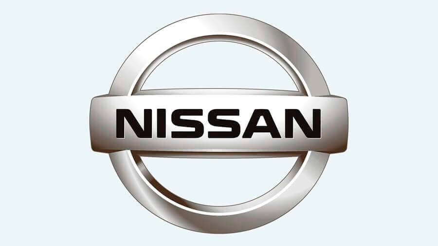 A silver nissan logo on a white background