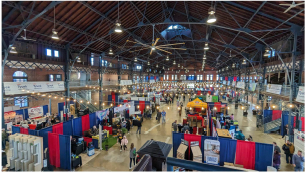 An aerial view of a large building filled with people