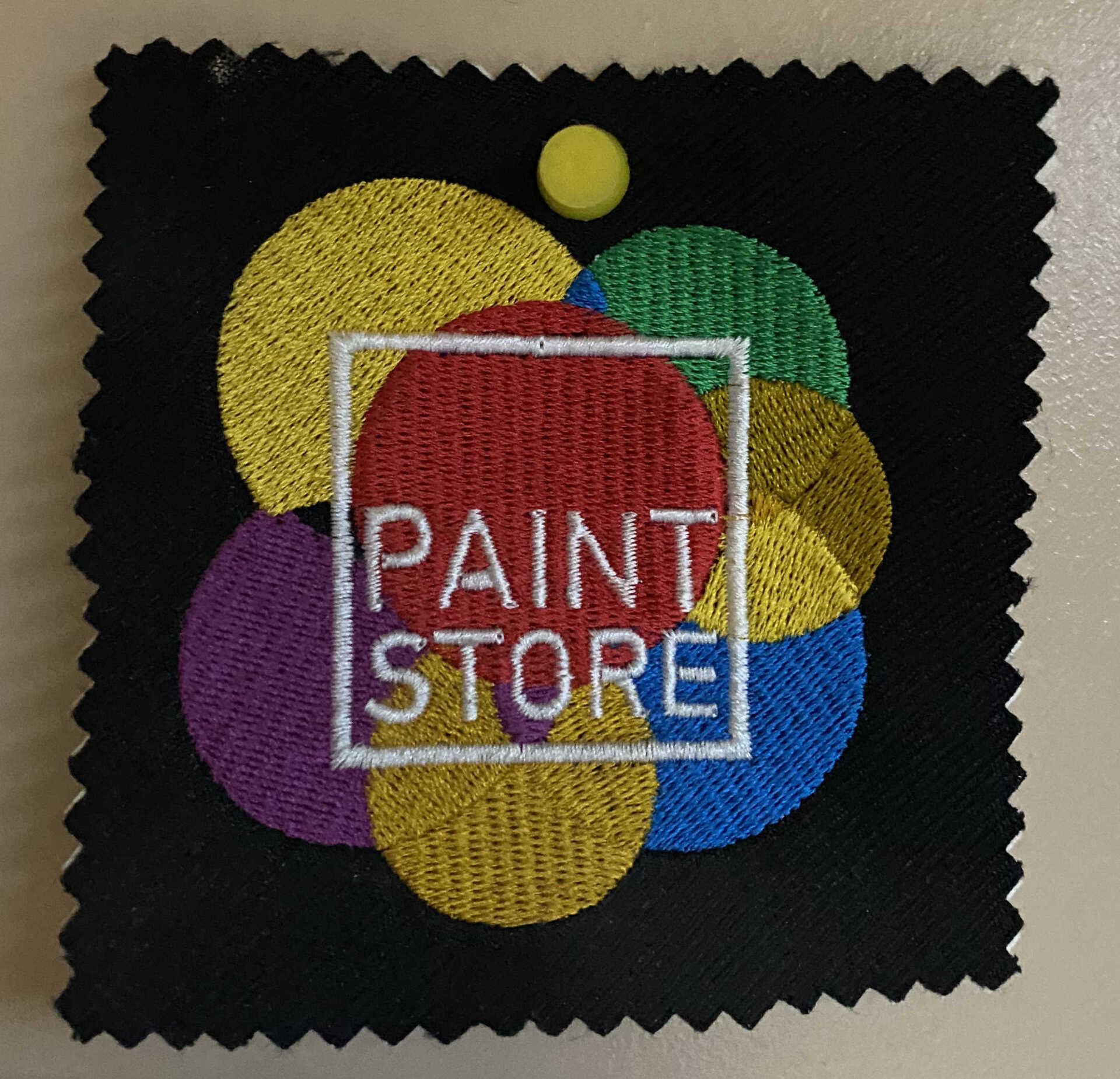 Black fabric sample with embroidered