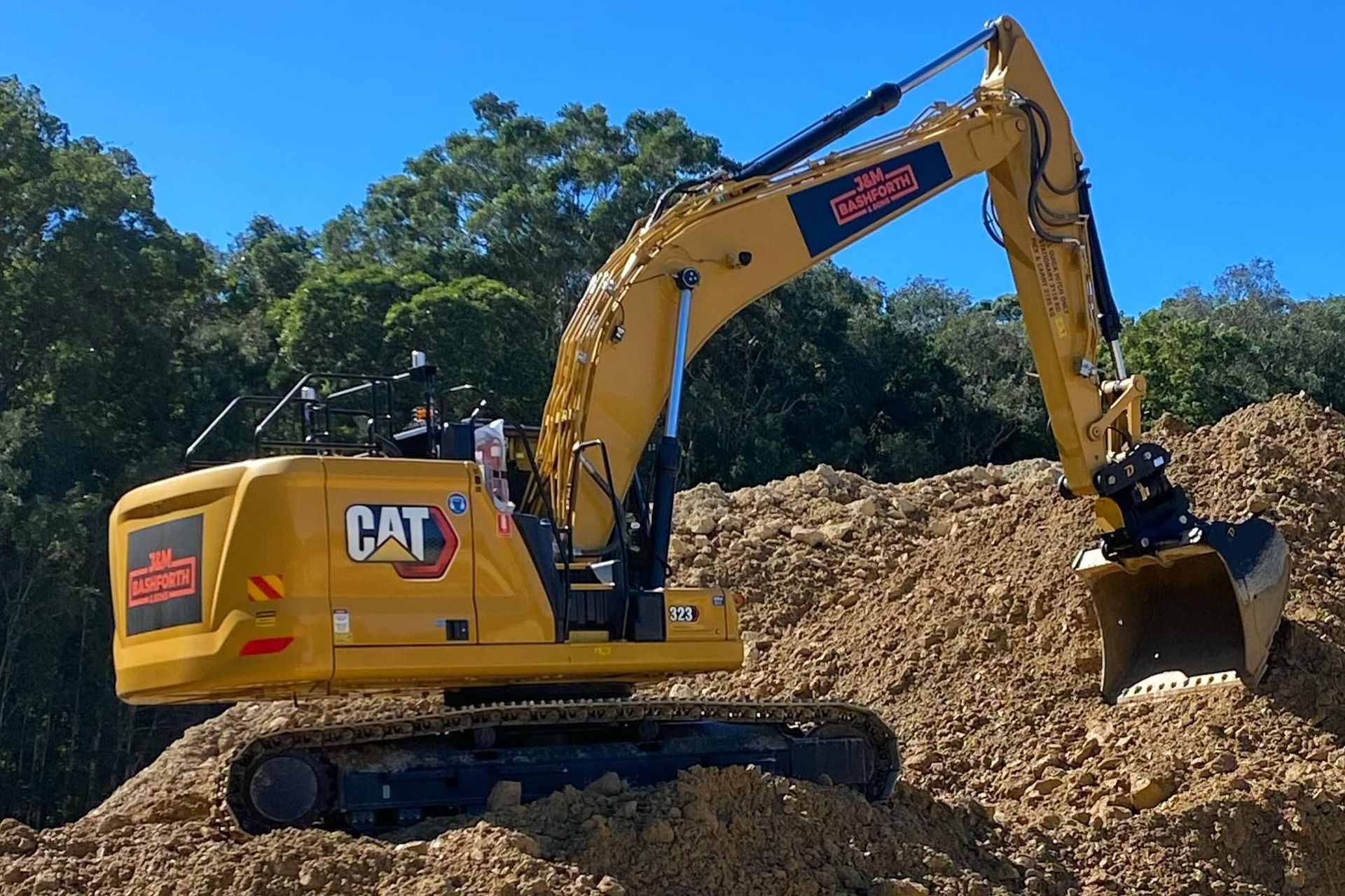 An Excavator On A Pile Of Land