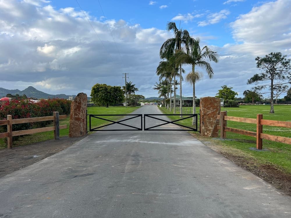 There Is A Wooden Fence Along The Side Of The Road — J & M Bashforth & Sons In Brunswick Heads, NSW