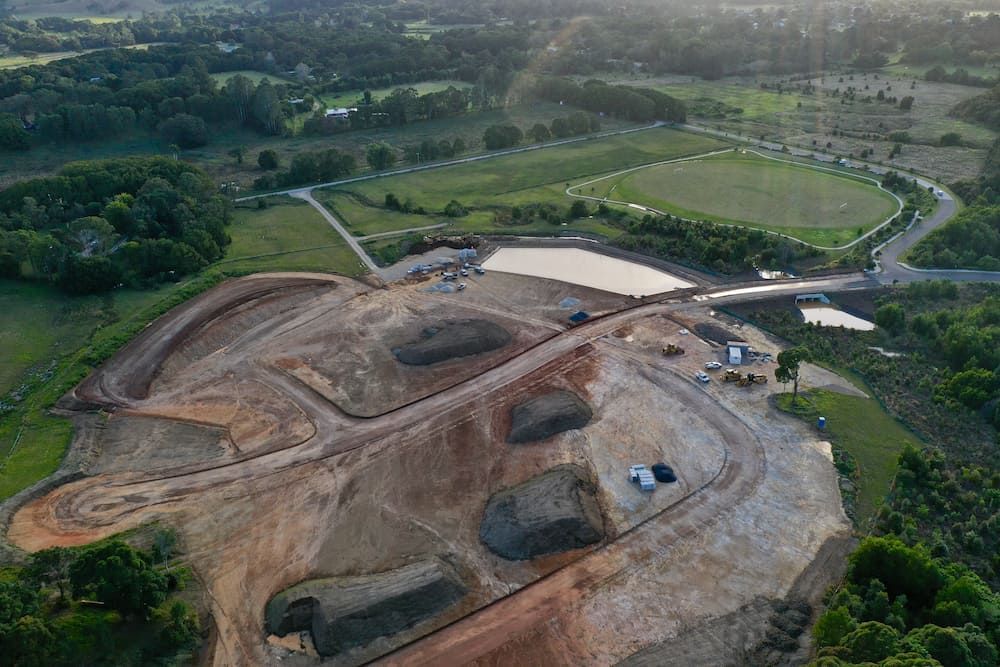 An Aerial View Of A Construction Site With A Lot Of Dirt And Trees — J & M Bashforth & Sons In Brunswick Heads, NSW
