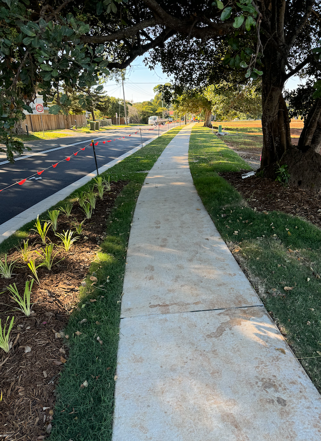 A FootPath Area With Grass Either Side And A Large Tree To The Right— J & M Bashforth & Sons In Brunswick Heads, NSW