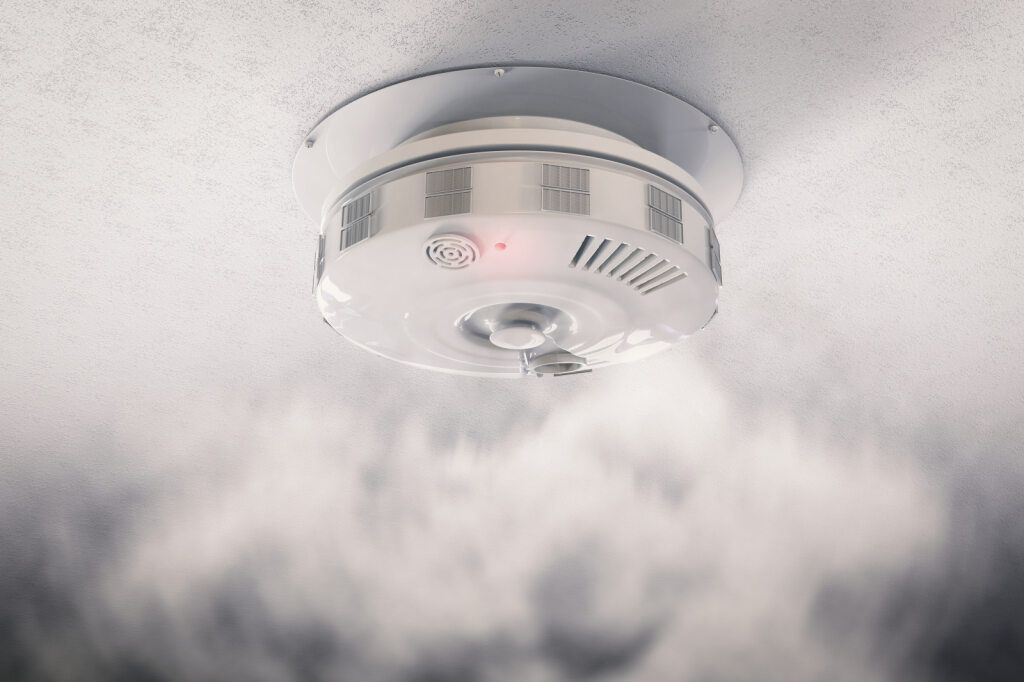 Smoke Detector on Ceiling, Red Light Flashing — A Step Above Electrical & Air Conditioning In Edmonton, QLD
