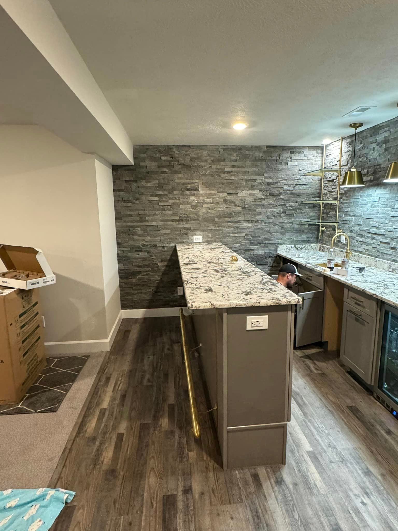 behind the counter view of basement kitchen and bar remodel