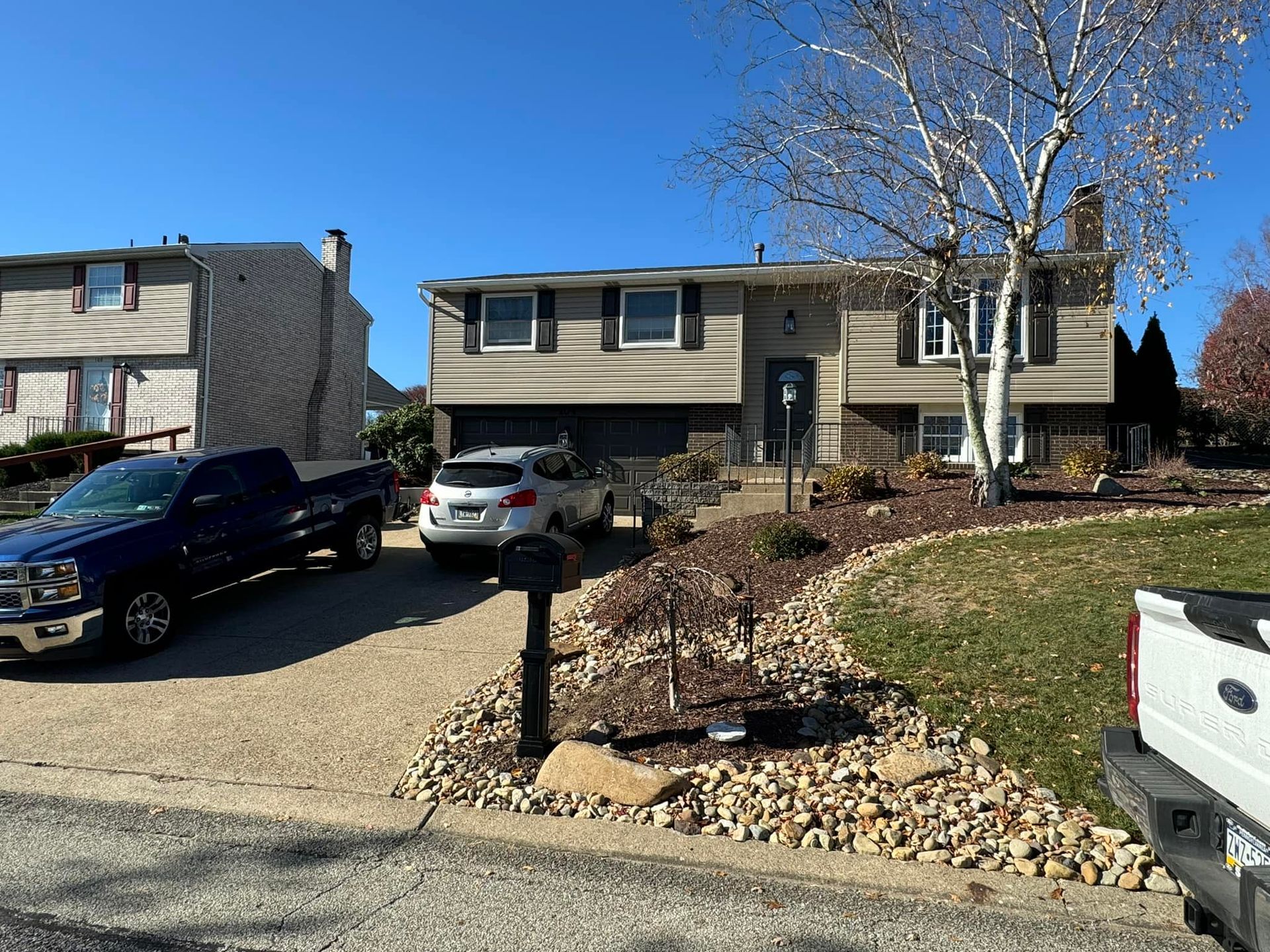 siding painted brown by Obringer's Painting and remodeling