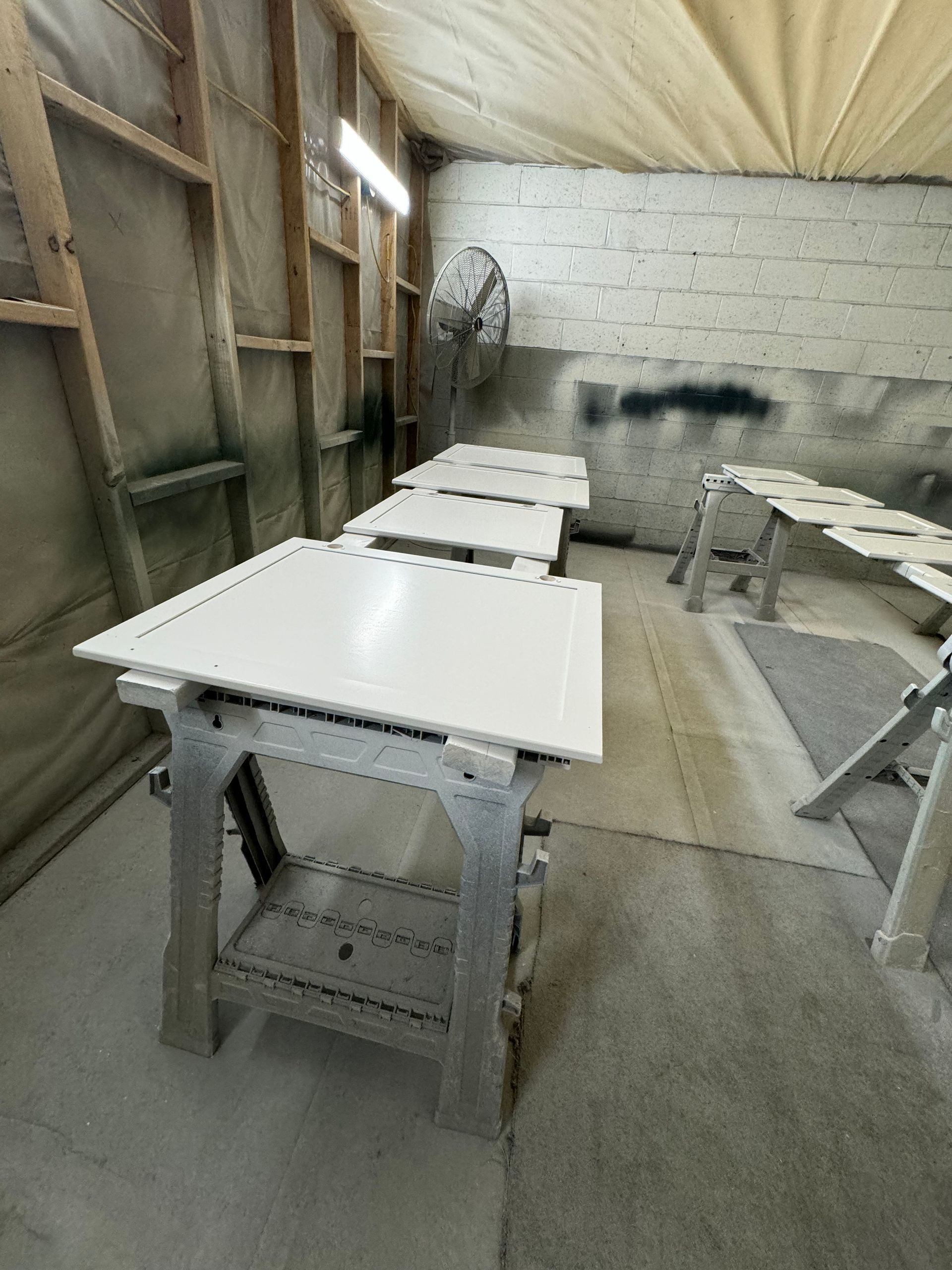cabinet doors being refinished white