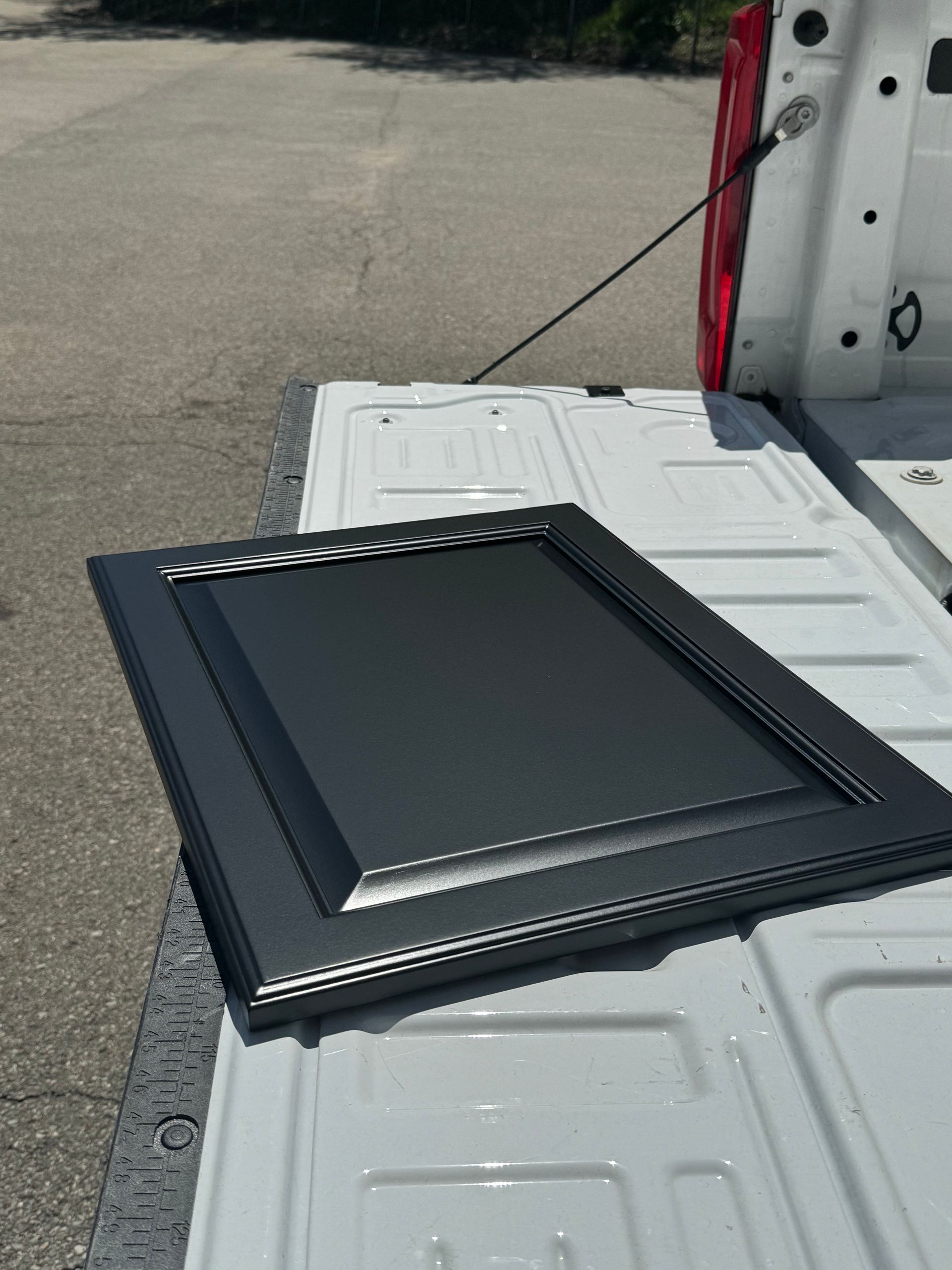 cabinet doors being refinished to black