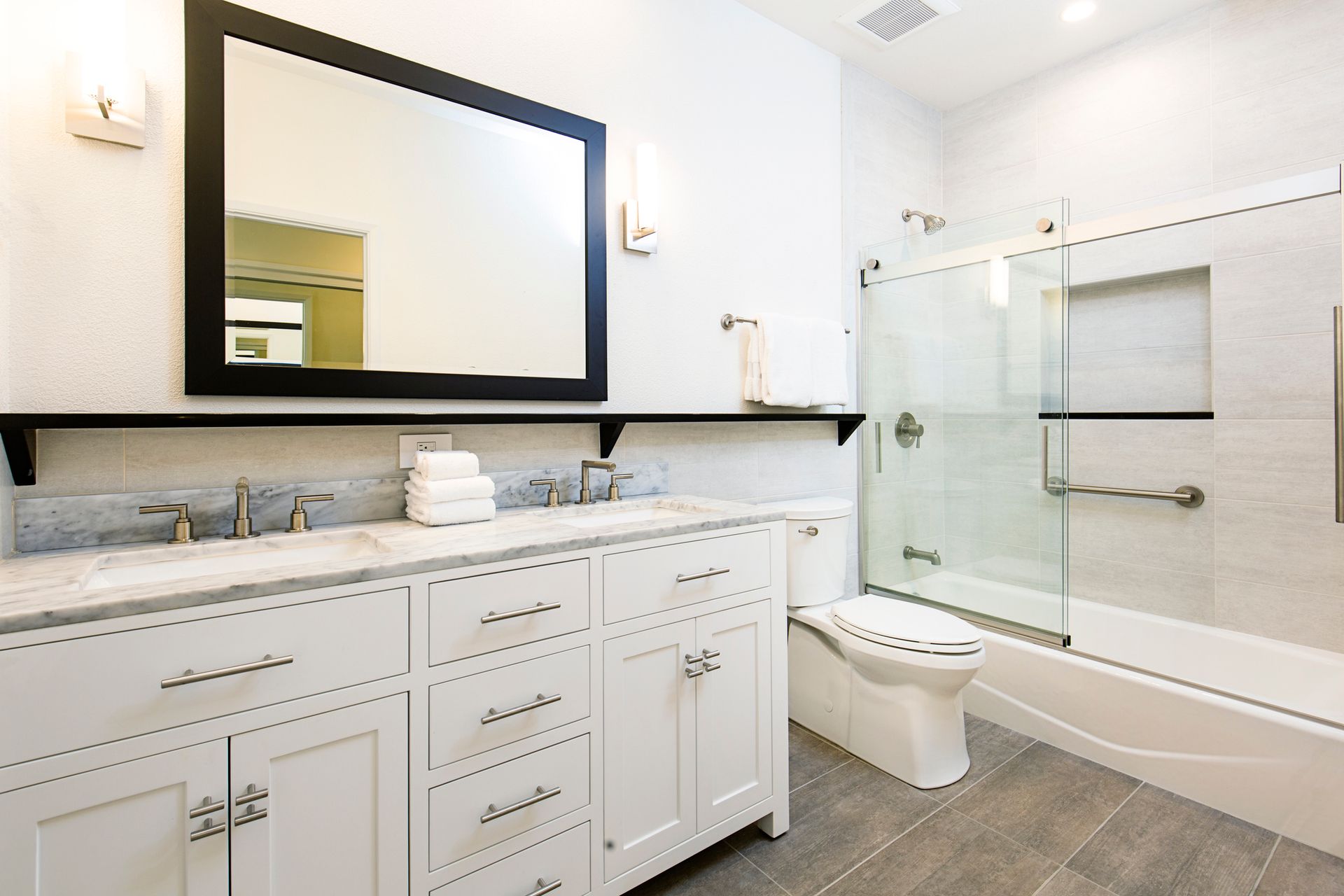 cabinets refinished white by Obringer's Painting and Remodeling