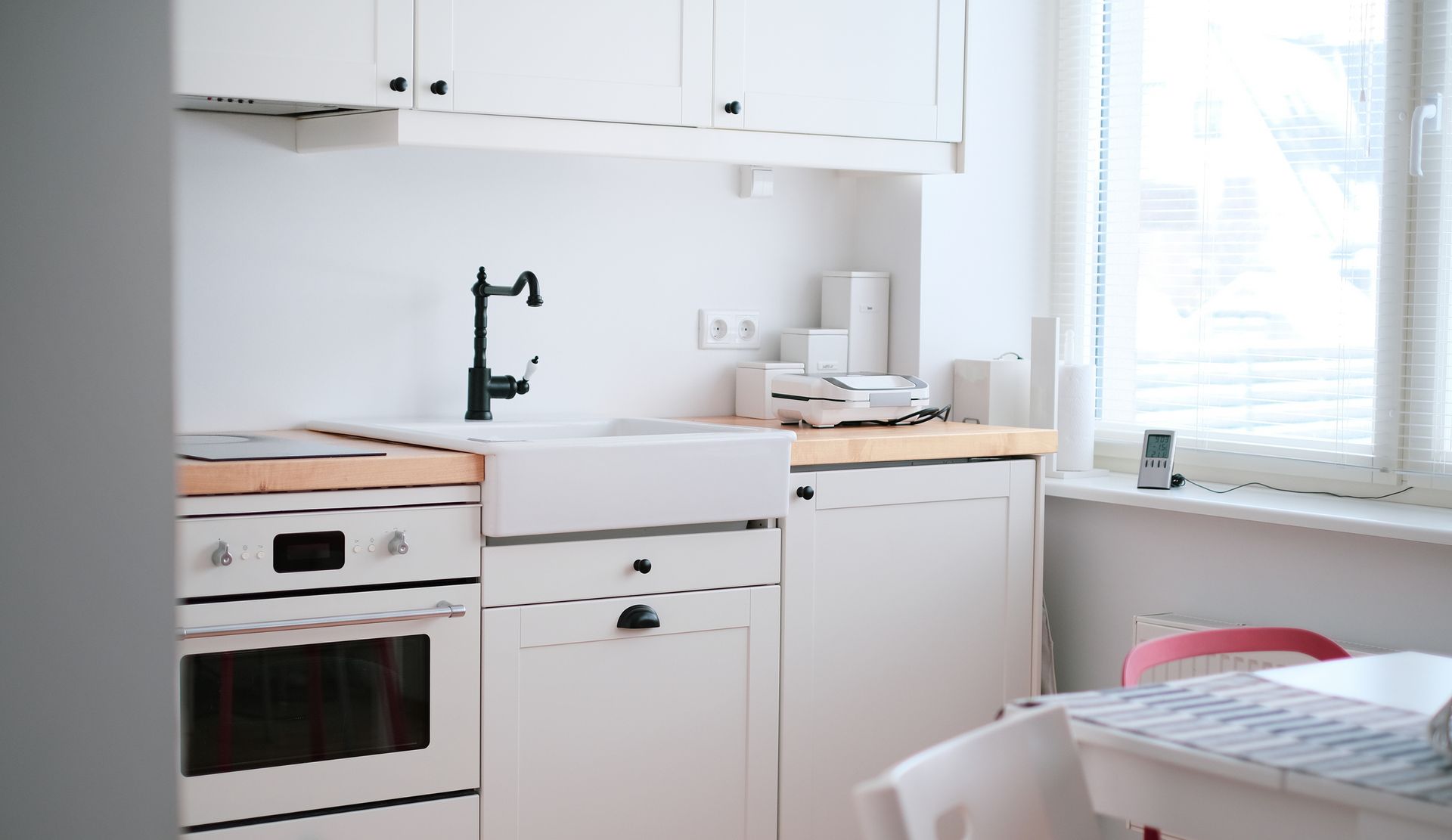 small light colored kitchen after remodeling