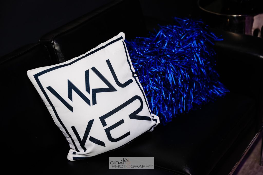 A white pillow with the word walker on it