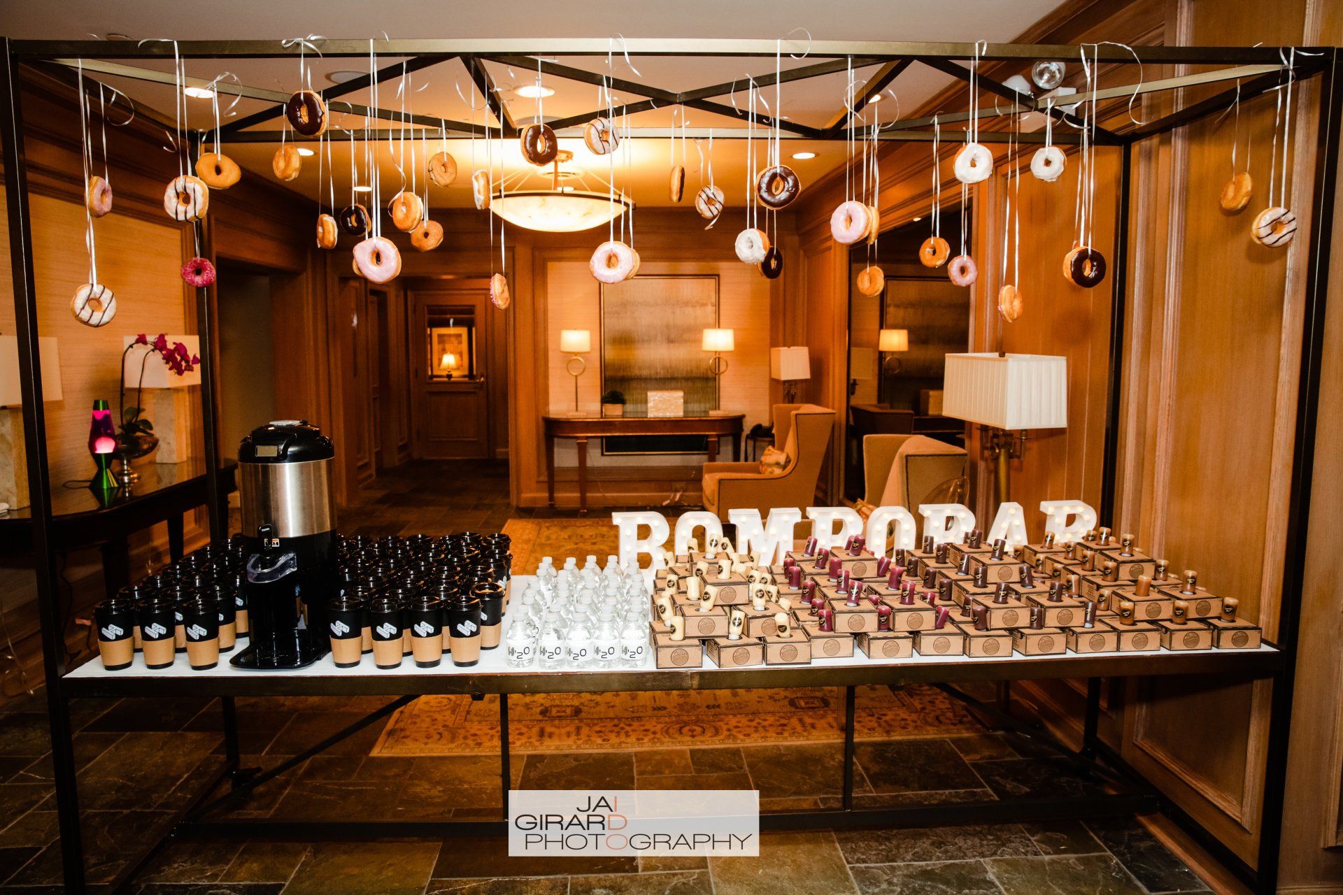 A table with a sign that says bombopap on it