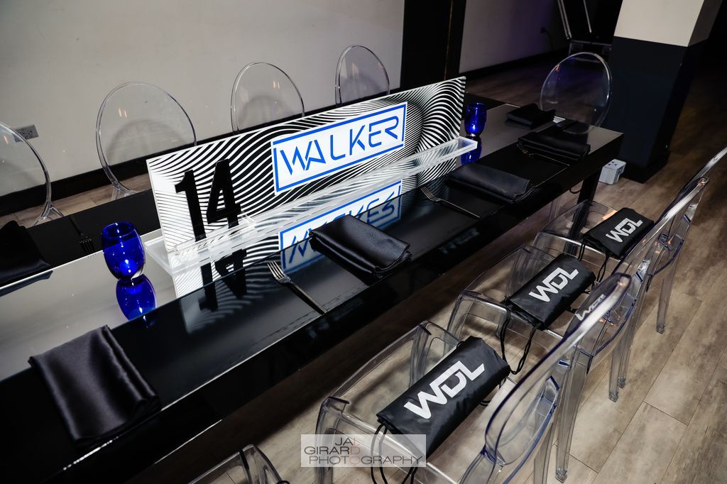 A long table with a sign that says walker on it