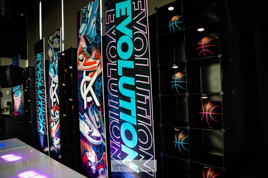 A row of colorful signs with the word evolution on them.