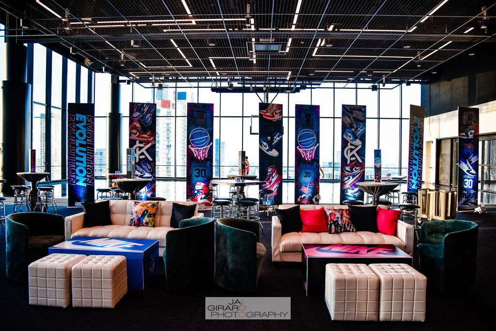 A large room with a lot of furniture and tables