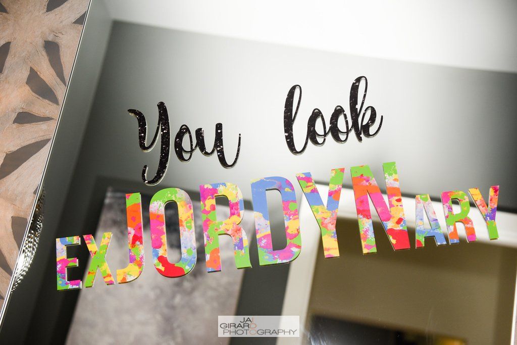 A sign that says you look extraordinary on it