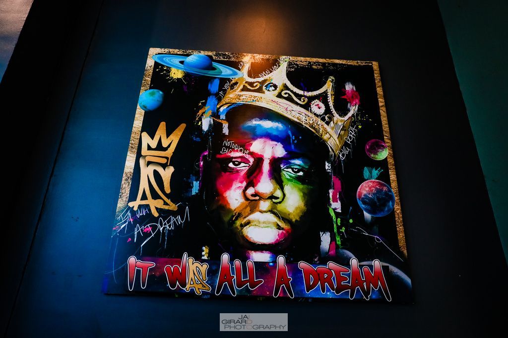 A painting of a man with a crown and the words it was a dream