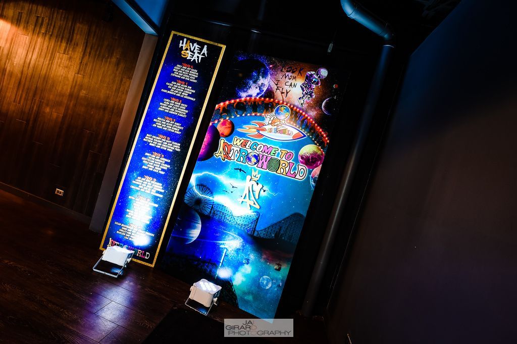 A large screen with chinese writing on it is sitting on a table.