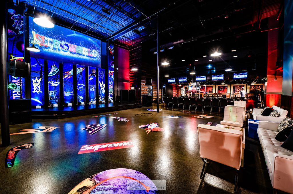 A large room with a lot of lights on the floor.