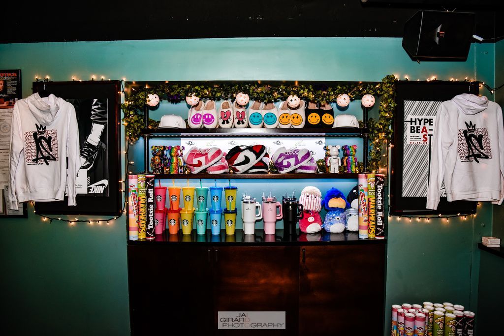 A store filled with lots of clothes and drinks.