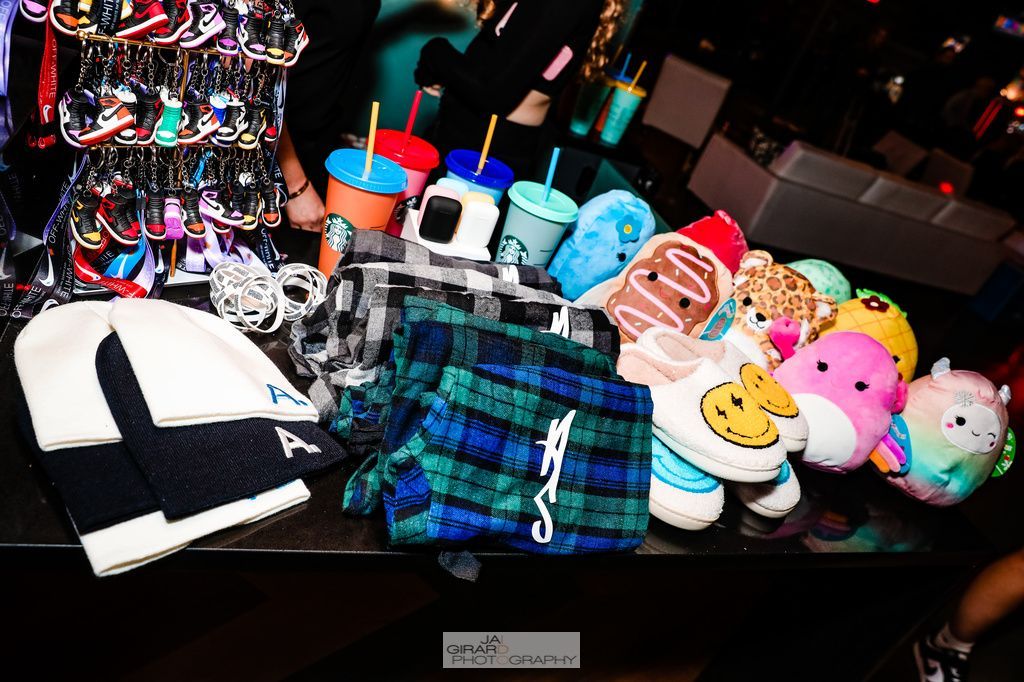 A table with a bunch of stuffed animals on it