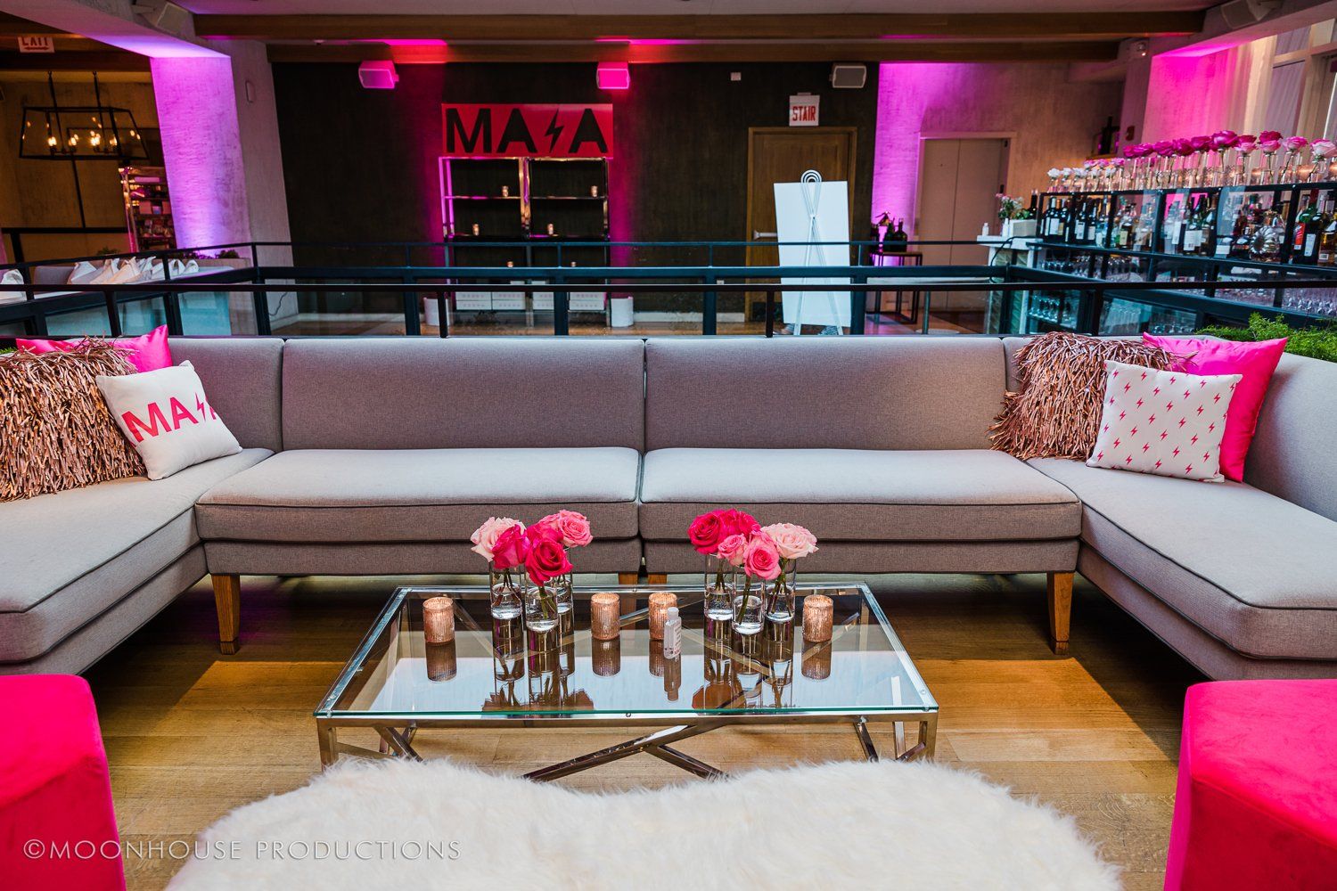 A living room with a couch and a coffee table