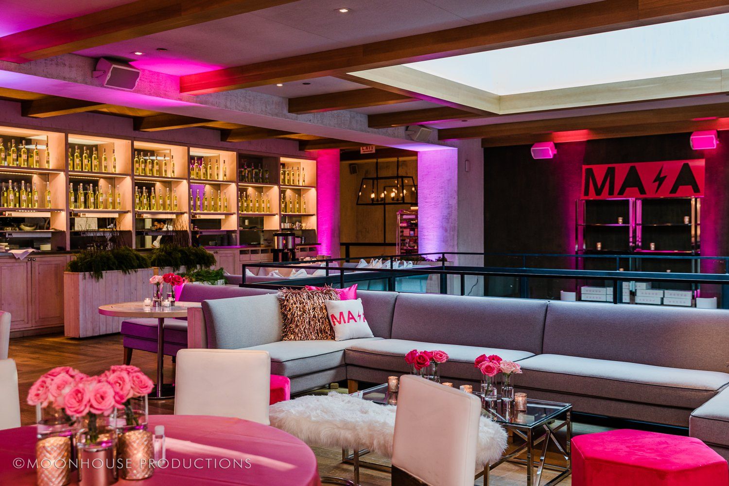 A large room with a lot of furniture and tables.