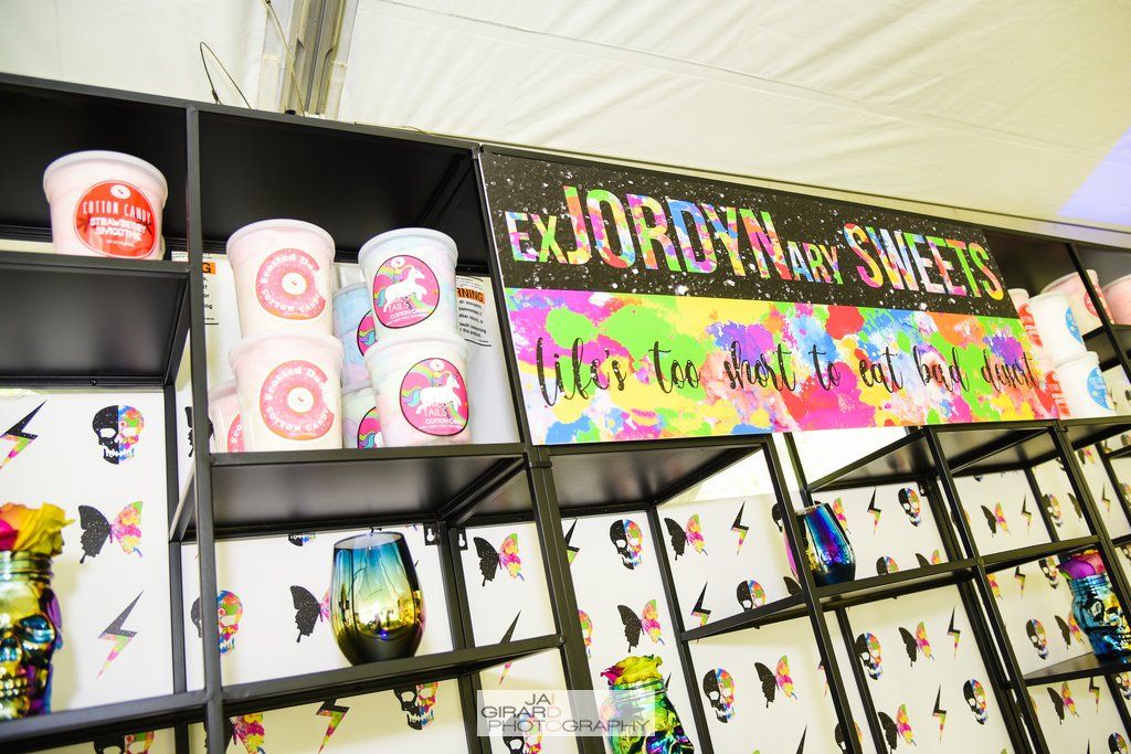 A shelf with a sign that says ' ex jordy ' on it