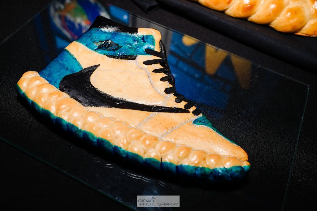 A cake in the shape of a nike shoe