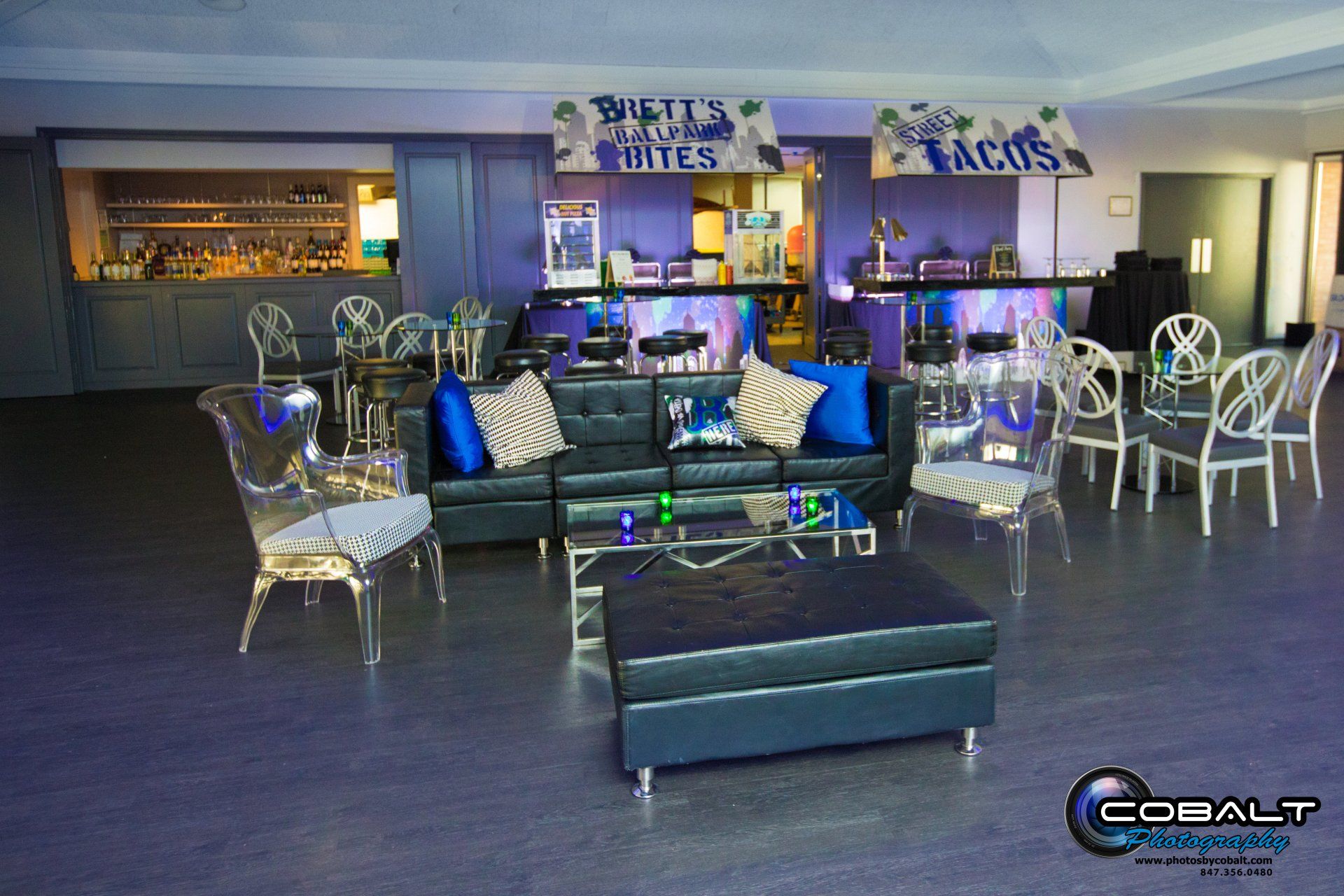 A room with a lot of furniture and a sign that says agave