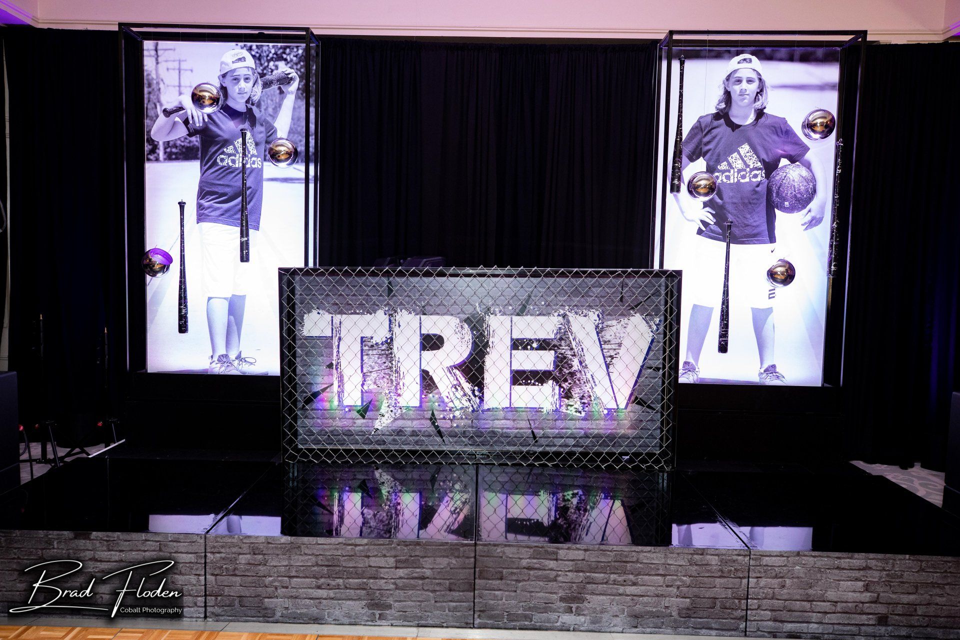 A stage with a sign that says trev on it.