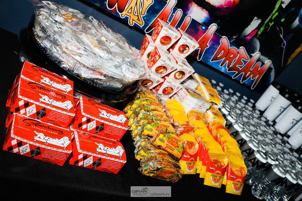 A display of candy and a sign that says dream