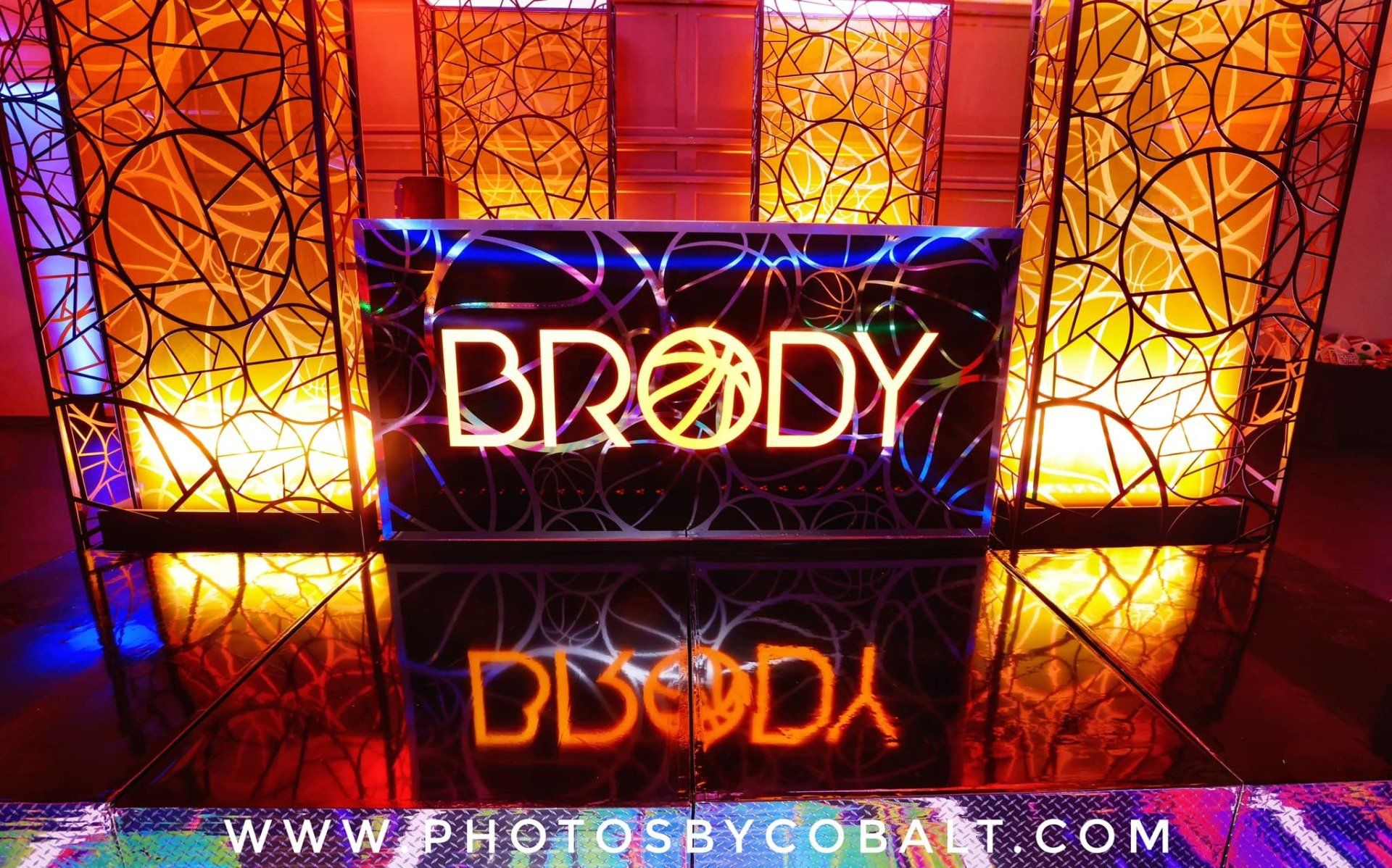 A dj booth with the name brody on it