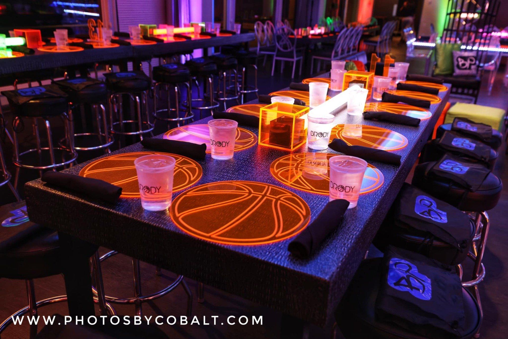 A long table with a basketball design on it