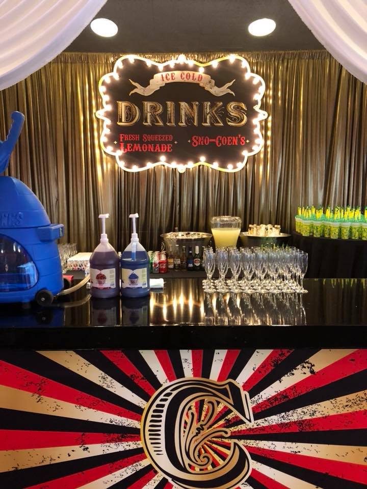 A bar with a sign that says drinks on it