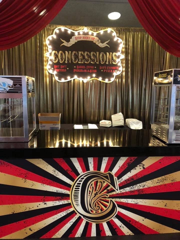 A table with a sign that says concessions on it