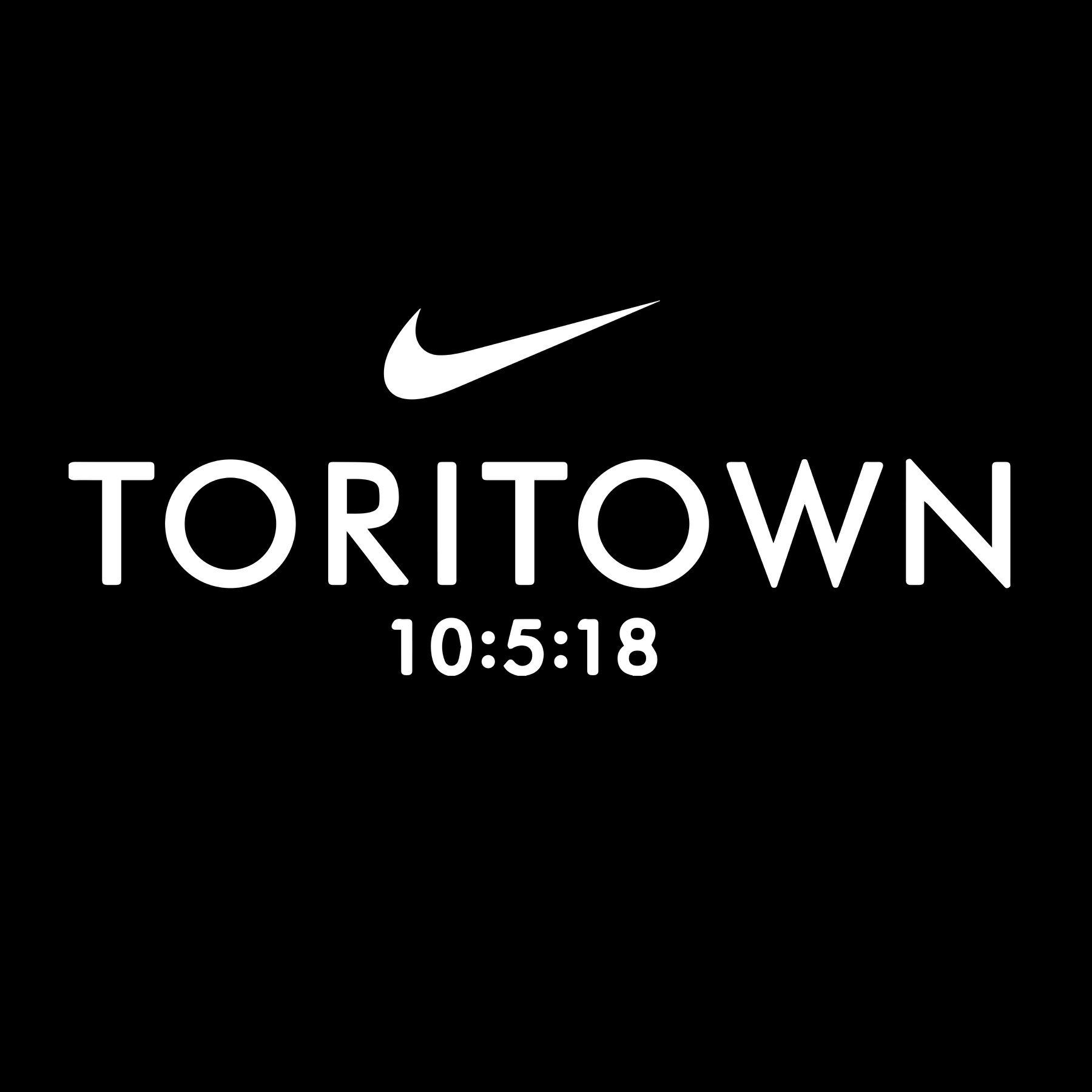 A white nike logo on a black background.