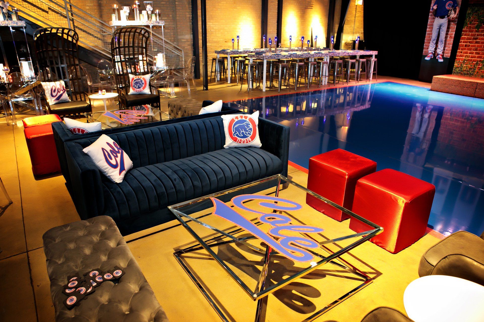 A living room with a couch and a table that says coca cola