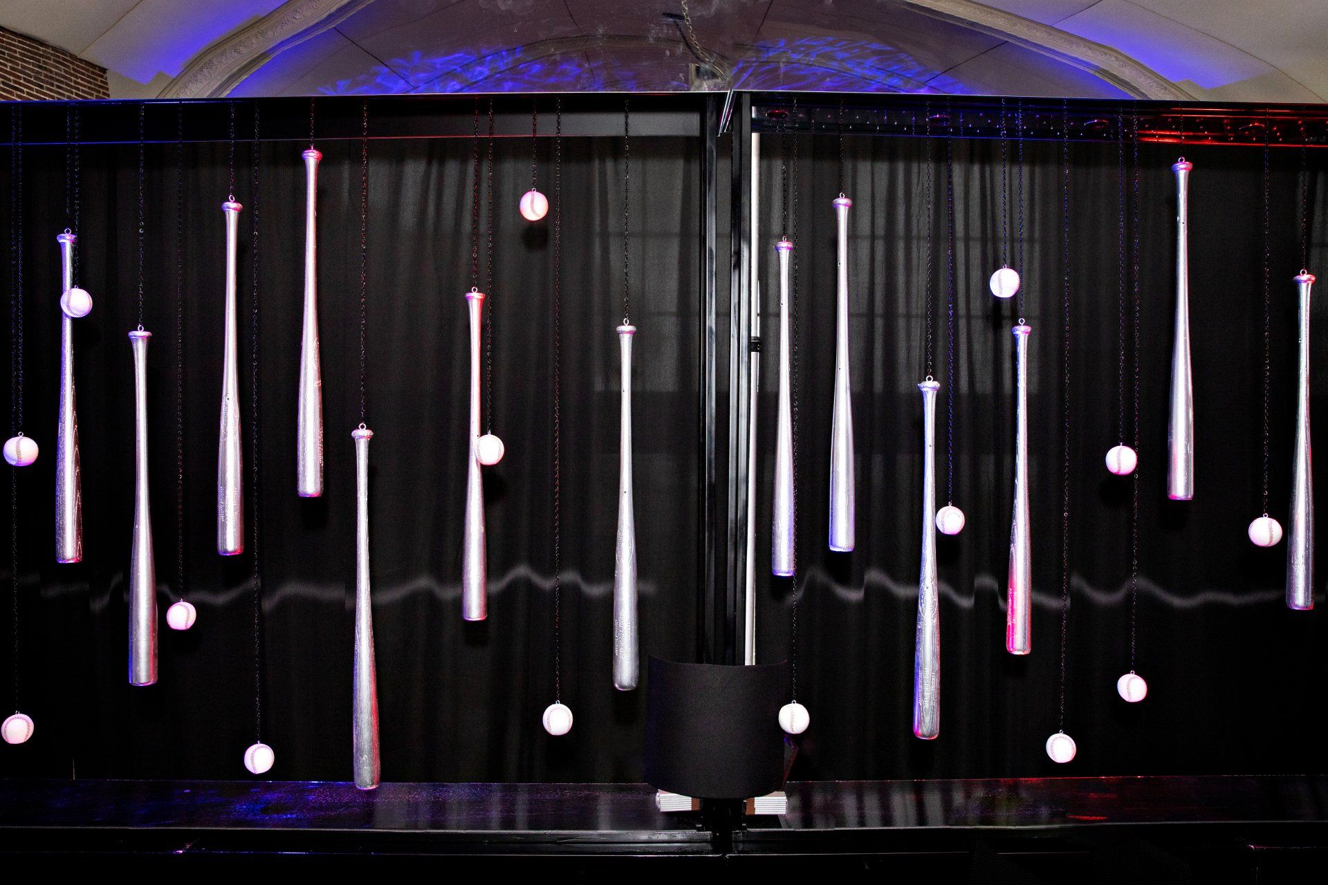 A black curtain with white lights hanging from it