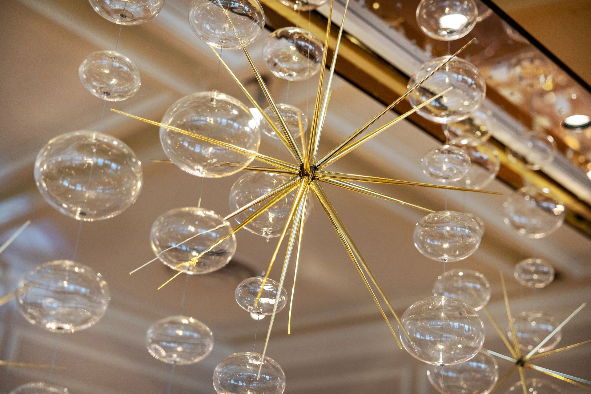 A chandelier with clear bubbles hanging from the ceiling