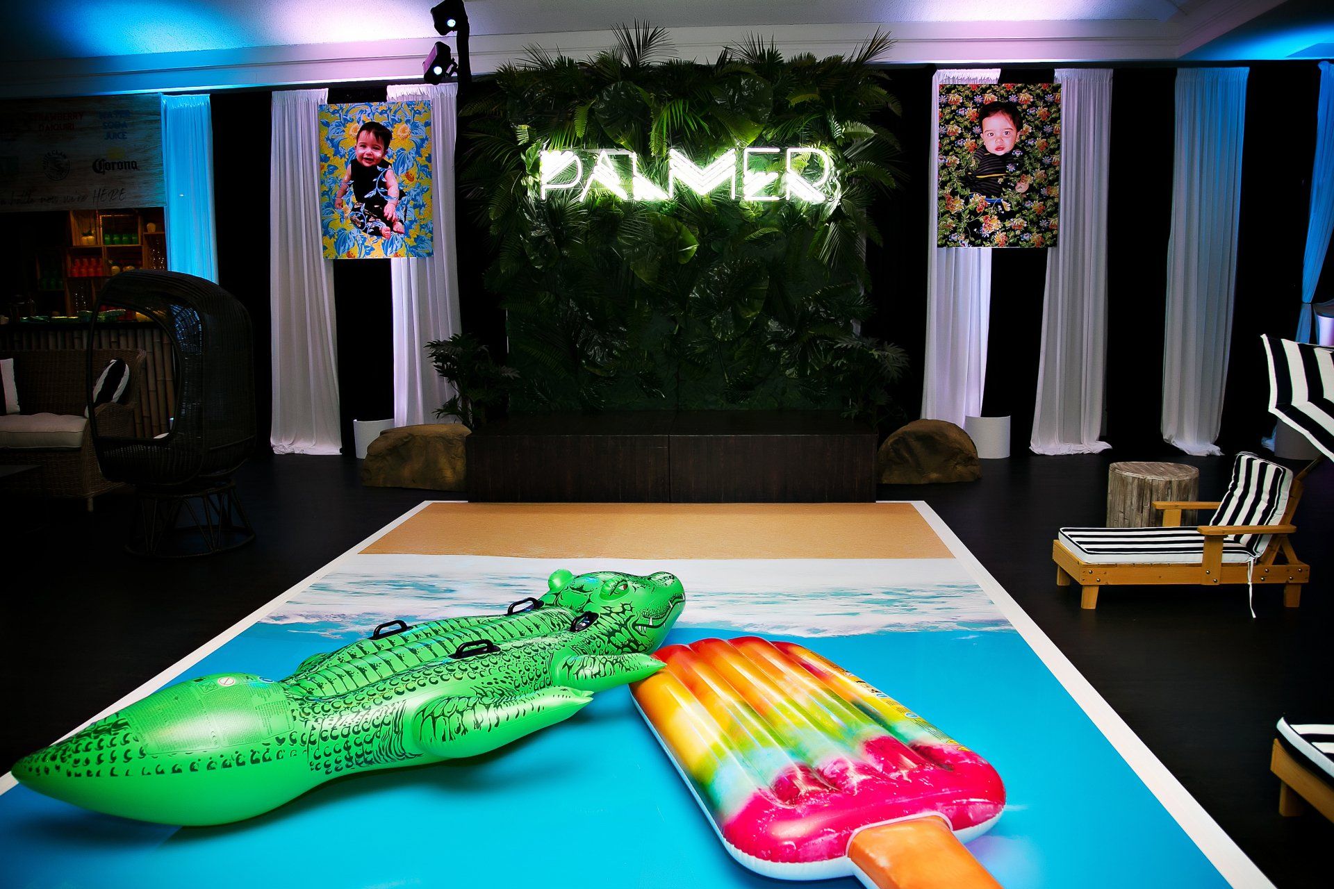 A room with a crocodile and a popsicle float on the floor.