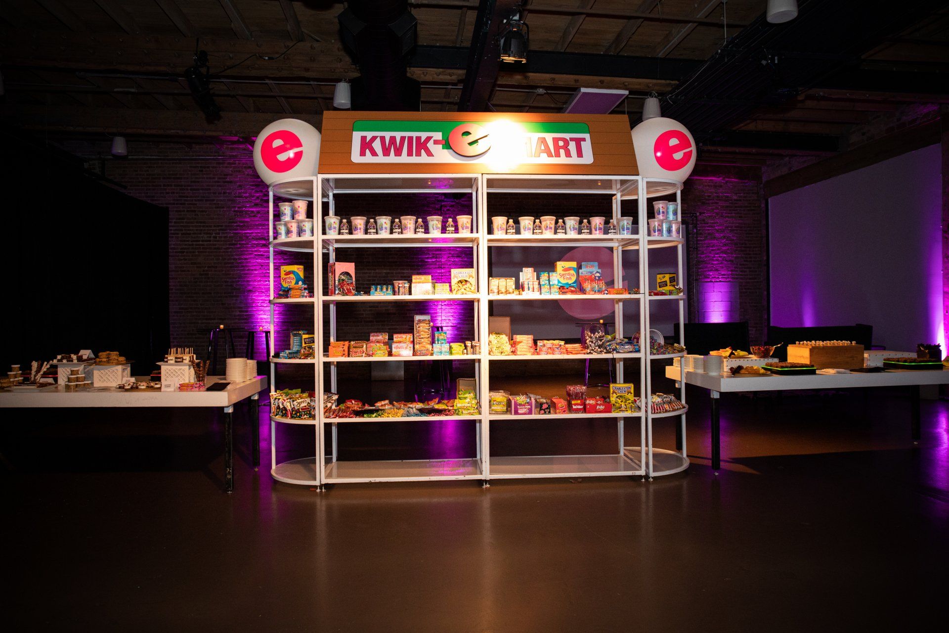 A kwik e mart display in a dark room