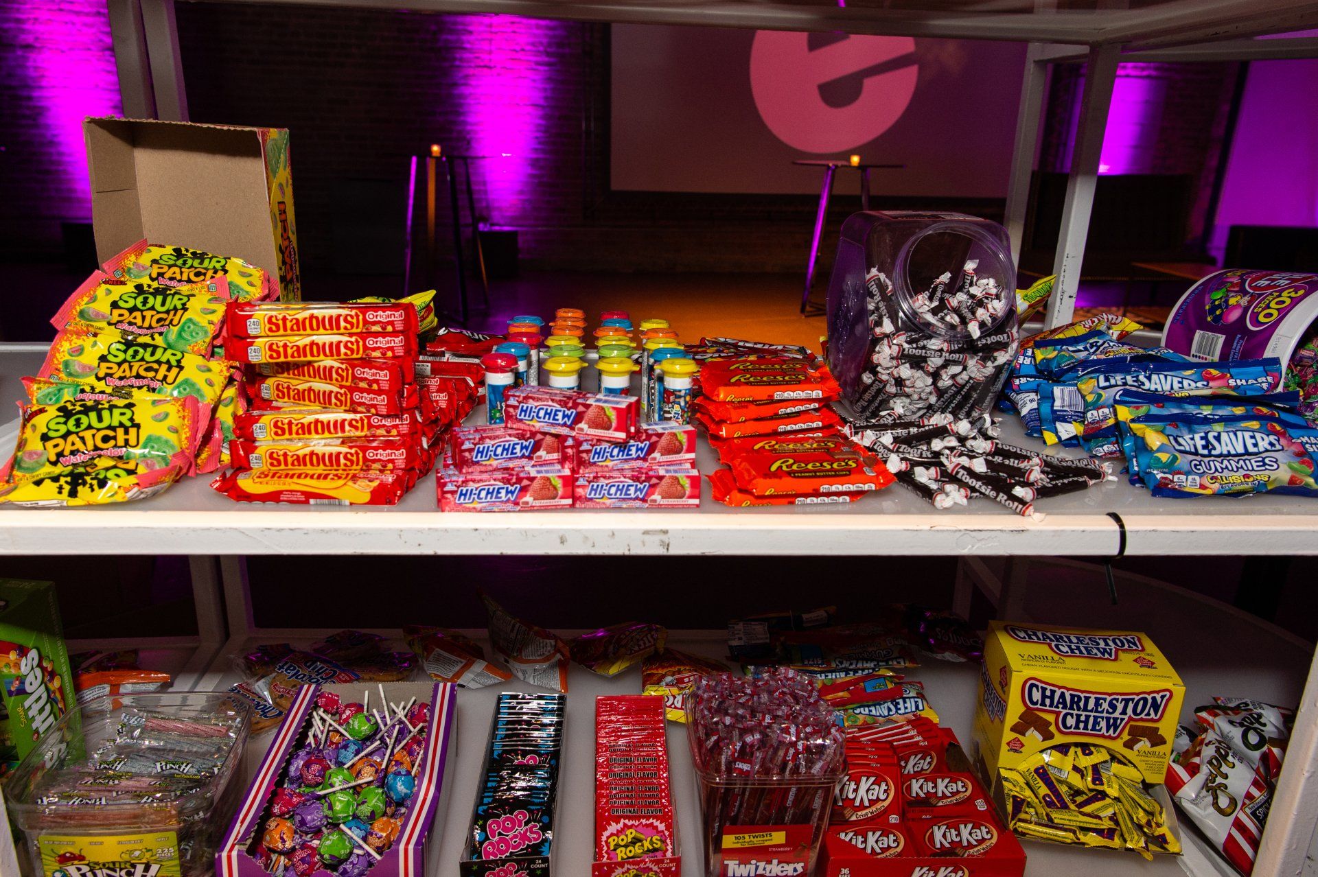 A shelf filled with lots of different types of candy