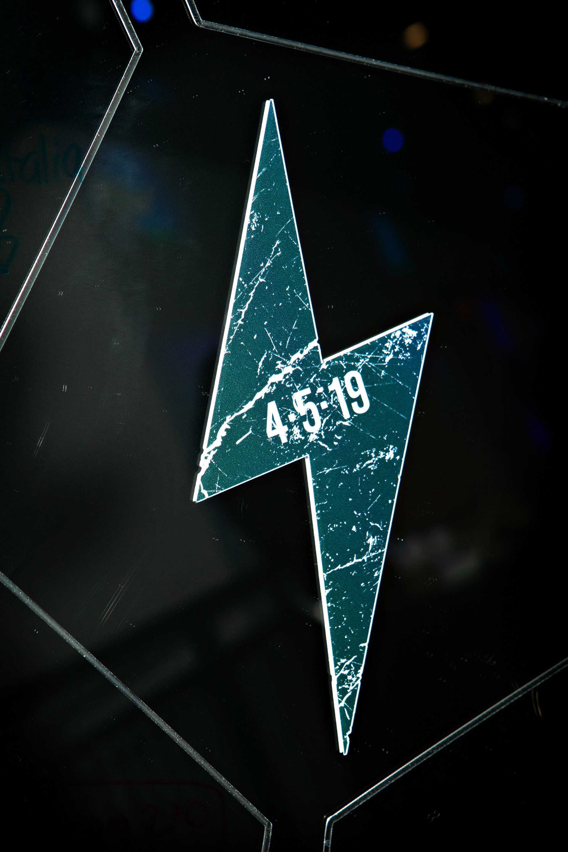 A lightning bolt with the date 4.5-19 on it