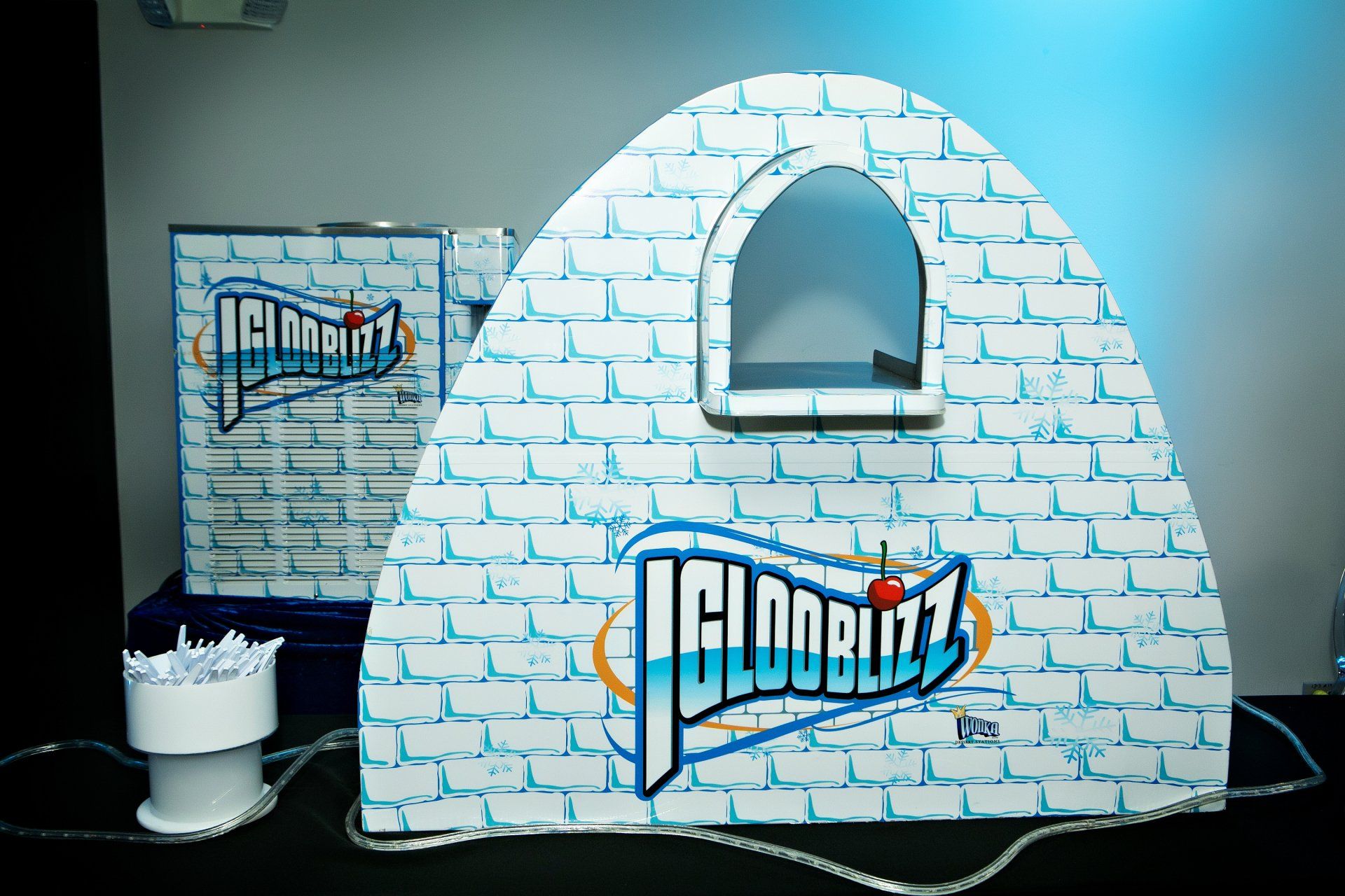 A cardboard igloo with the word iglooblitz on it