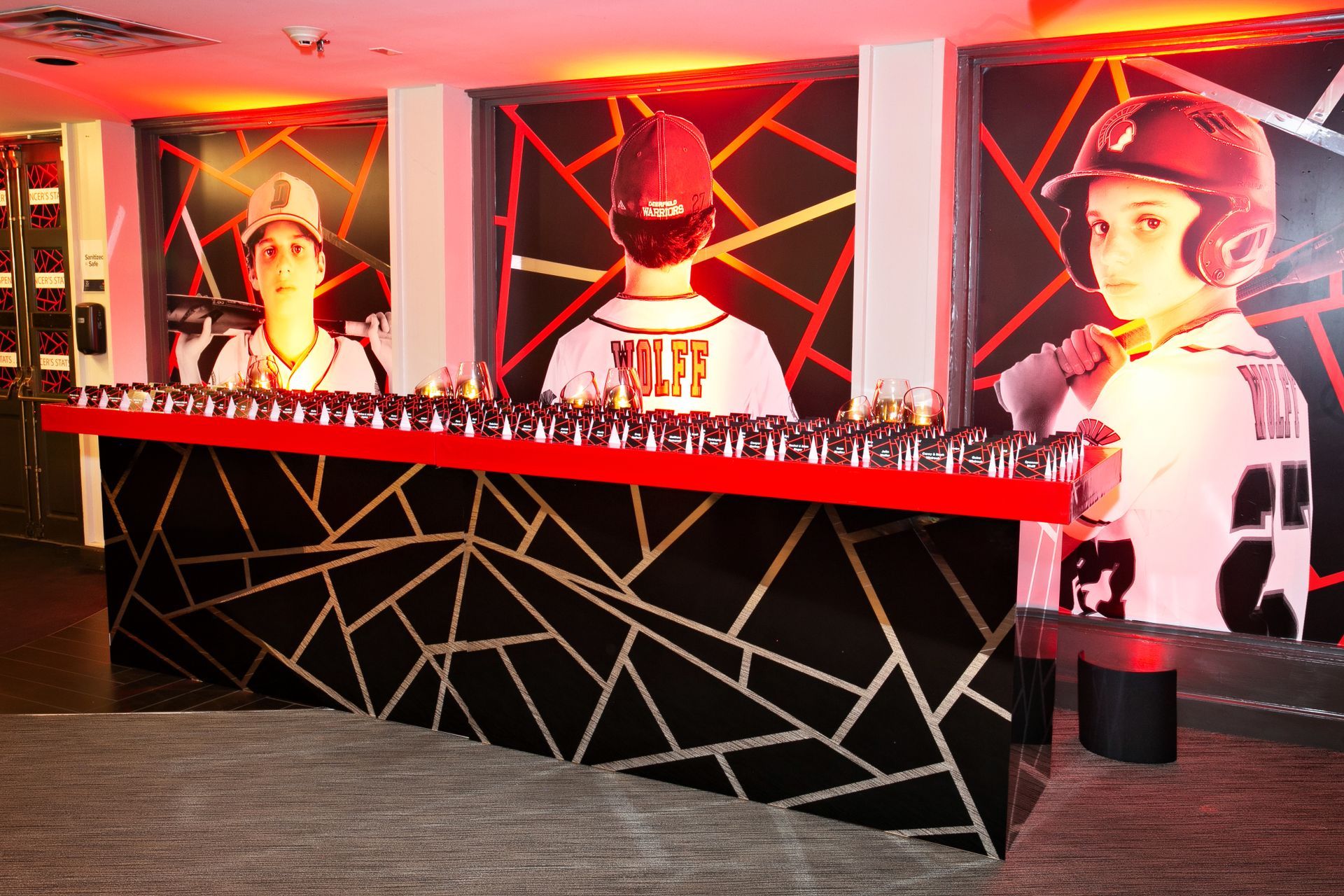 A bar with a picture of a baseball player on the wall